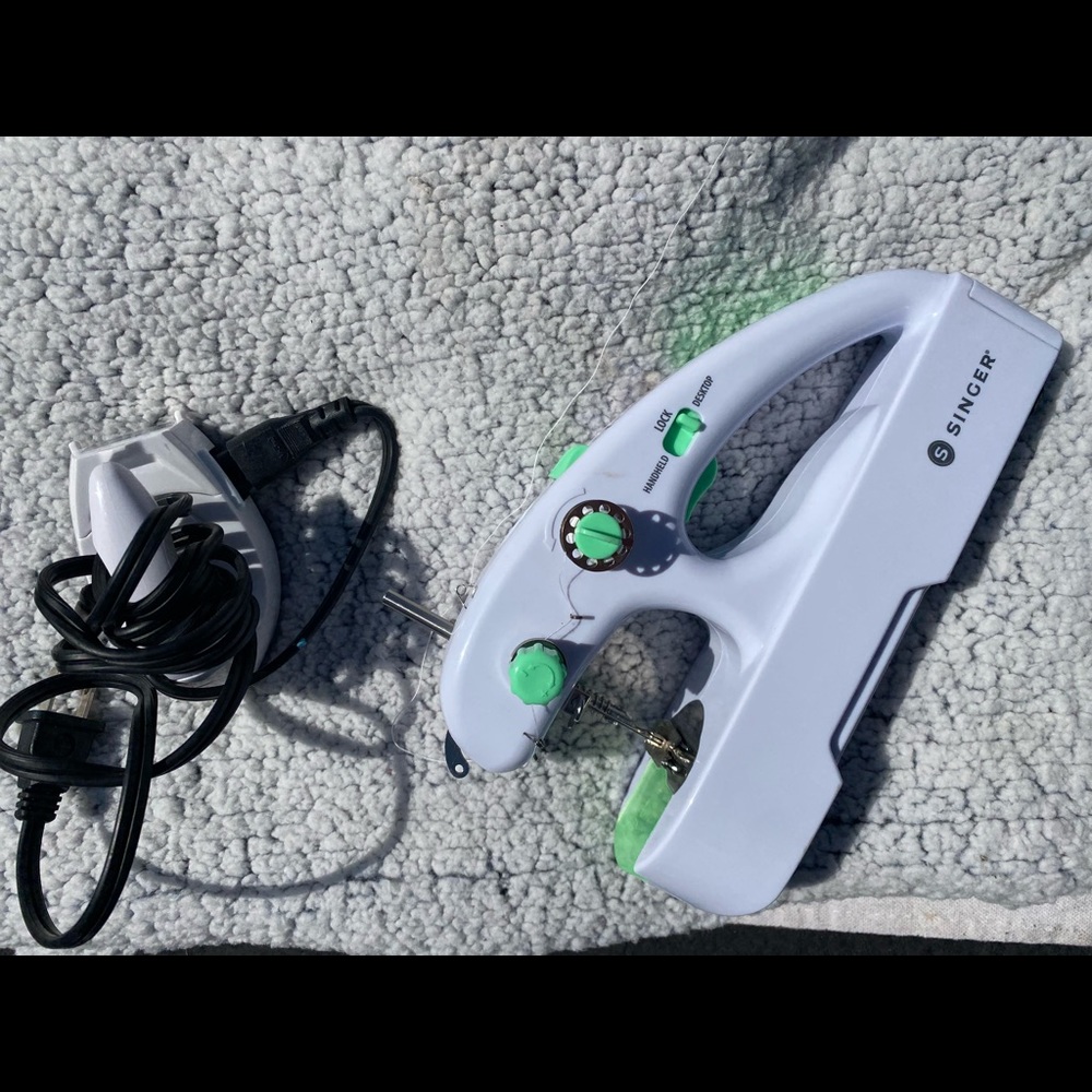 Handheld / table top sewing machine and mini iron